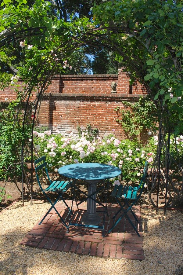 Cafe table in a rose garden