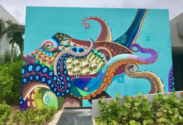 A giant colorful wall mural of an octopus at the Andaz Mayakoba Resort.
