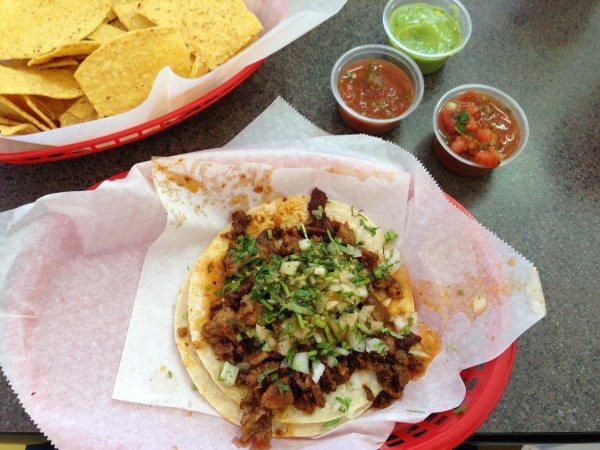 pork taco with salsa and chips