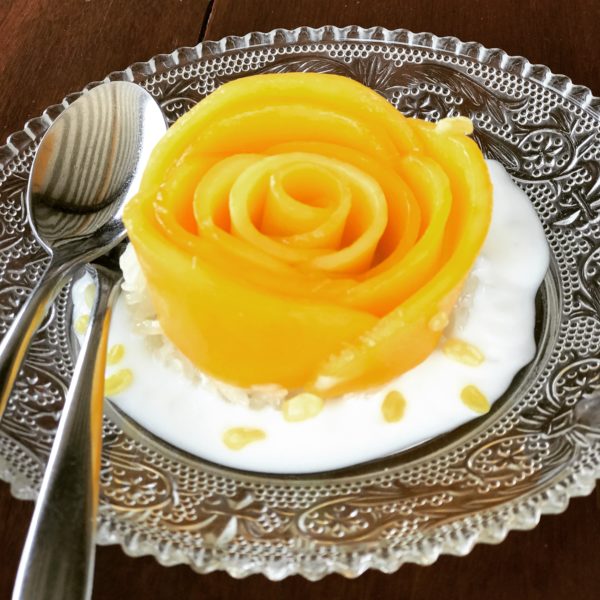 Delicate-and-sweet-mango-sticky-rice-in-Thailand. Ten reasons to visit Thailand and the best reason is the Mango Sticky Rice.