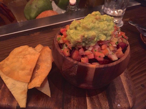 Rice and beans with pork belly and guacamole