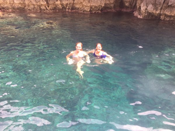 Jacqueline and I exploring a cove after jumping in the water from our tour boat. We loved being on our little wooden boat with our captain Stefano.